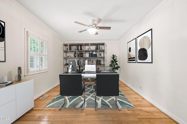 1514 Lawrence Rd, Creedmoor, NC 27522 - office area featuring ornamental molding, ceiling fan, wood finished floors, and baseboards