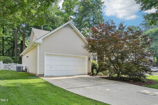 1102 Laurens Way, Knightdale, NC 27545 - view of home's exterior featuring cooling unit, concrete driveway, an attached garage, and a shingled roof