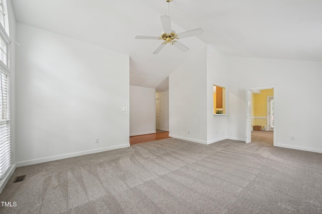 1102 Laurens Way, Knightdale, NC 27545 - carpeted empty room with baseboards, ceiling fan, and high vaulted ceiling