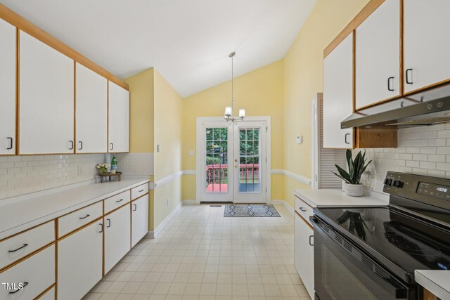 1102 Laurens Way, Knightdale, NC 27545 - kitchen featuring black / electric stove, under cabinet range hood, light countertops, white cabinets, and vaulted ceiling