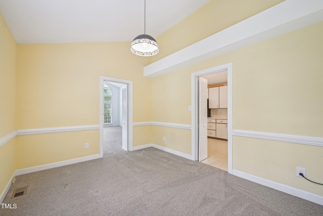1102 Laurens Way, Knightdale, NC 27545 - carpeted empty room with baseboards and vaulted ceiling