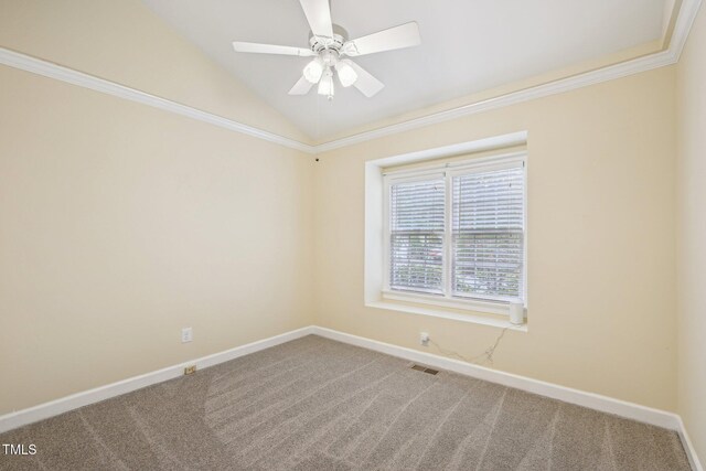 1102 Laurens Way, Knightdale, NC 27545 - carpeted spare room featuring baseboards, vaulted ceiling, a ceiling fan, and ornamental molding
