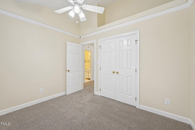 1102 Laurens Way, Knightdale, NC 27545 - unfurnished bedroom with carpet floors, a closet, baseboards, and a ceiling fan
