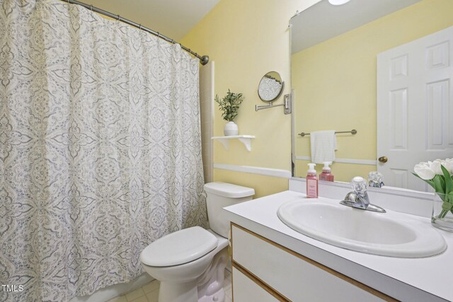 1102 Laurens Way, Knightdale, NC 27545 - full bathroom with vanity, toilet, tile patterned flooring, and a shower with curtain