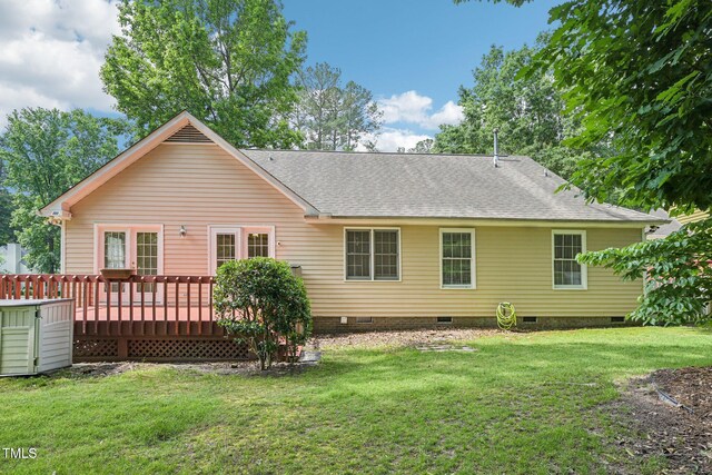 1102 Laurens Way, Knightdale, NC 27545 - rear view of house with crawl space, a shingled roof, a deck, and a lawn
