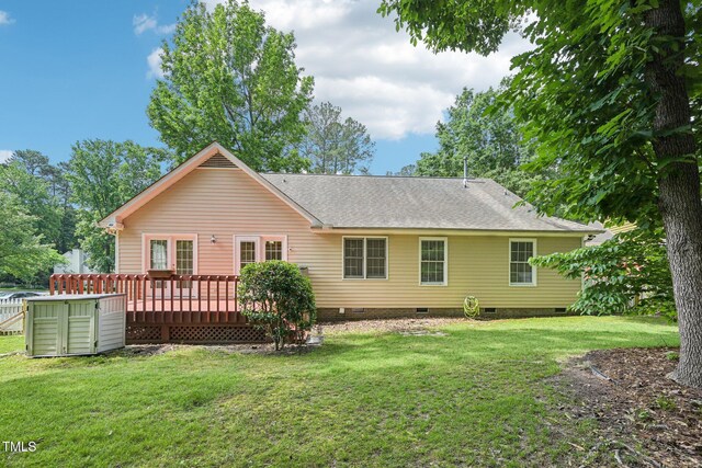1102 Laurens Way, Knightdale, NC 27545 - back of property with crawl space, a wooden deck, a lawn, and a shingled roof