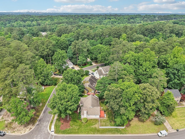 1102 Laurens Way, Knightdale, NC 27545 - aerial view of property and surrounding area featuring a heavily wooded area