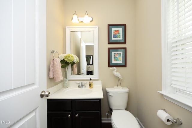half bath with toilet and vanity