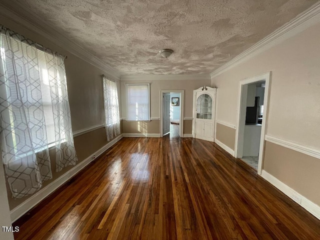 1609 Main St, Scotland Neck, NC 27874 - unfurnished living room with hardwood / wood-style flooring, a textured ceiling, baseboards, and ornamental molding