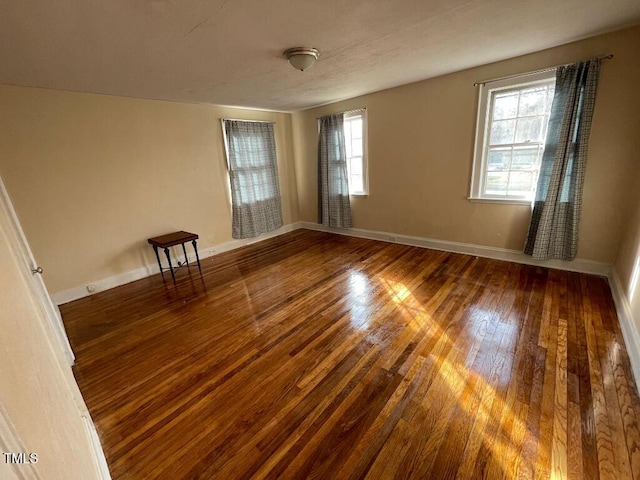 1609 Main St, Scotland Neck, NC 27874 - unfurnished room featuring wood finished floors and baseboards