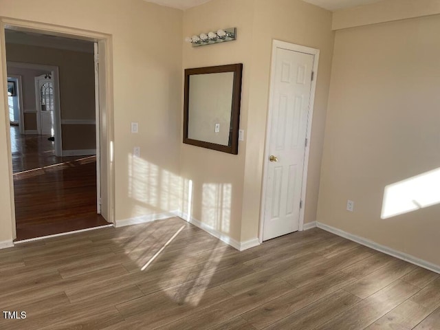 1609 Main St, Scotland Neck, NC 27874 - unfurnished room with wood finished floors and baseboards
