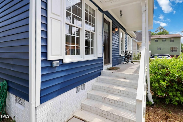 1508 Malta Ave, Raleigh, NC 27610 - property entrance featuring a porch and crawl space