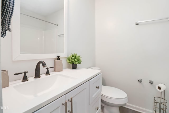 1508 Malta Ave, Raleigh, NC 27610 - full bathroom featuring toilet, vanity, and a shower