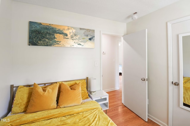 1508 Malta Ave, Raleigh, NC 27610 - bedroom with light wood-type flooring