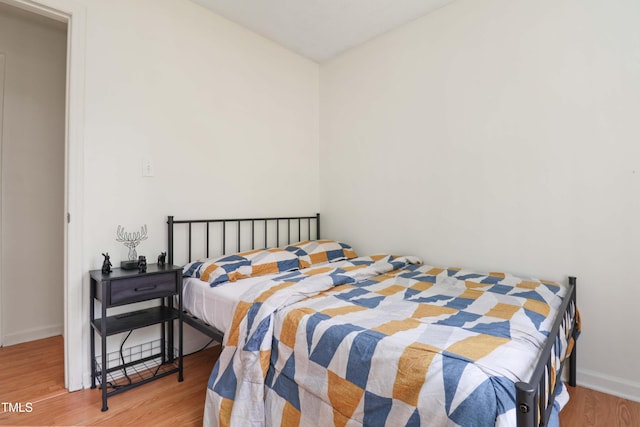 1508 Malta Ave, Raleigh, NC 27610 - bedroom with wood finished floors and baseboards