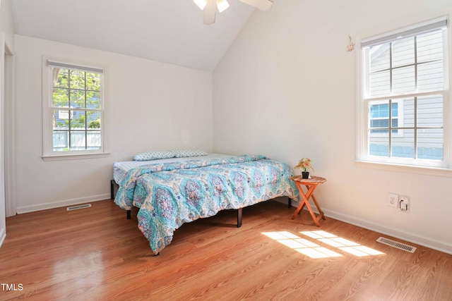 1508 Malta Ave, Raleigh, NC 27610 - bedroom with lofted ceiling, wood finished floors, baseboards, and a ceiling fan