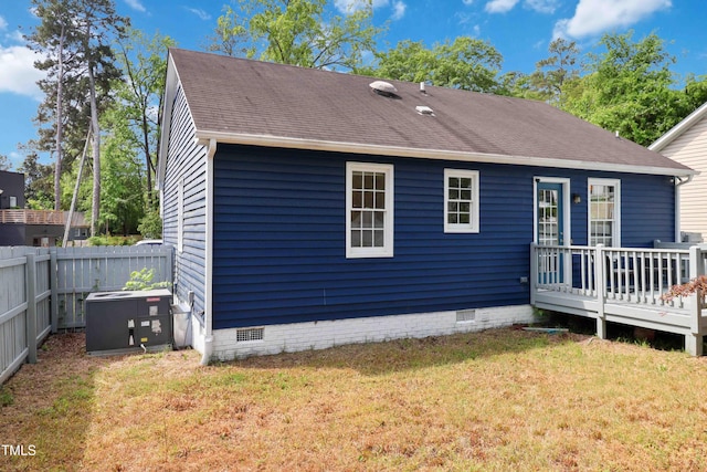 1508 Malta Ave, Raleigh, NC 27610 - rear view of house featuring crawl space, cooling unit, a wooden deck, and roof with shingles
