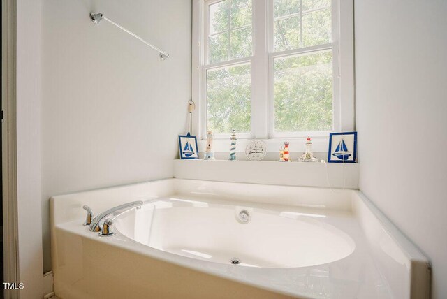 full bathroom featuring a garden tub
