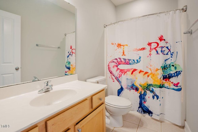 full bath with tile patterned flooring, toilet, vanity, and a shower with curtain