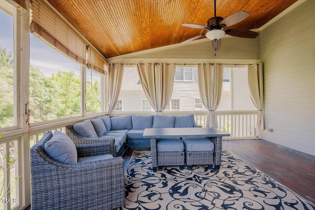 sunroom featuring outdoor lounge area, vaulted ceiling, and ceiling fan