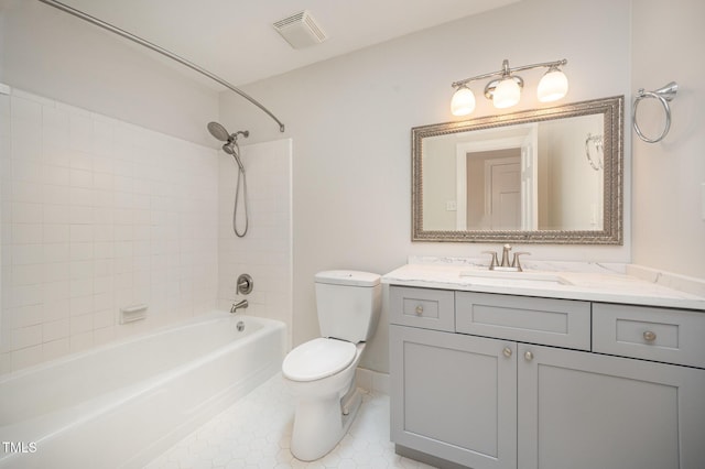 full bathroom featuring toilet, vanity, shower / bathtub combination, and tile patterned flooring