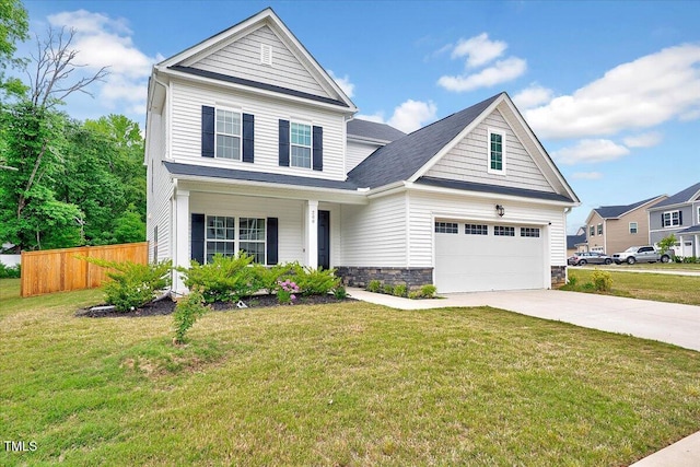 traditional-style home with concrete driveway, a garage, and stone siding