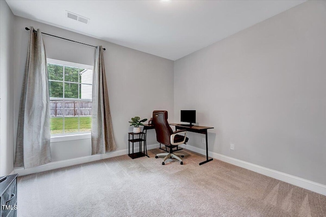 carpeted office with baseboards