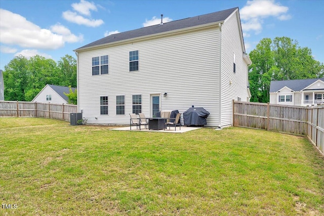 back of house with a patio and central AC