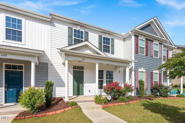 1027 Myers Point Dr, Morrisville, NC 27560 - view of front facade featuring a front yard and covered porch