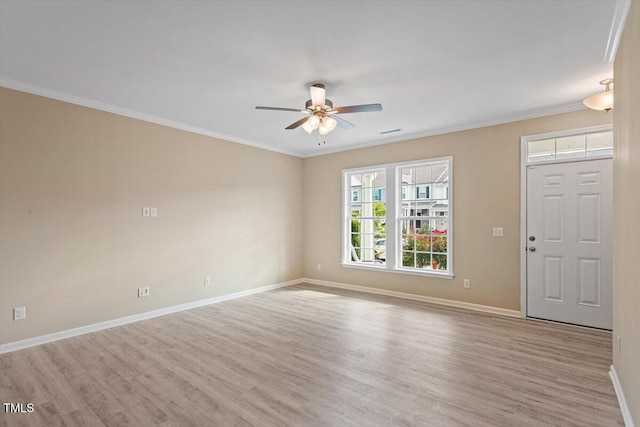 1027 Myers Point Dr, Morrisville, NC 27560 - foyer featuring ceiling fan, wood finished floors, baseboards, and crown molding