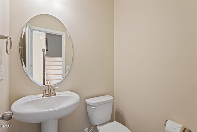 1027 Myers Point Dr, Morrisville, NC 27560 - half bathroom featuring toilet and a sink