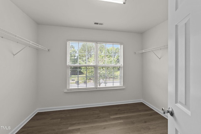 204 Trevor Ridge Dr, Holly Springs, NC 27540 - spacious closet featuring dark wood finished floors