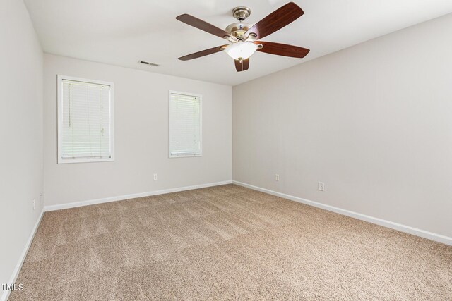 105 Hiddenwood Ct, Garner, NC 27529 - carpeted empty room with baseboards and ceiling fan