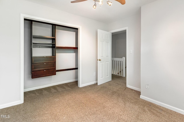 105 Hiddenwood Ct, Garner, NC 27529 - unfurnished bedroom with carpet flooring, baseboards, a closet, and ceiling fan