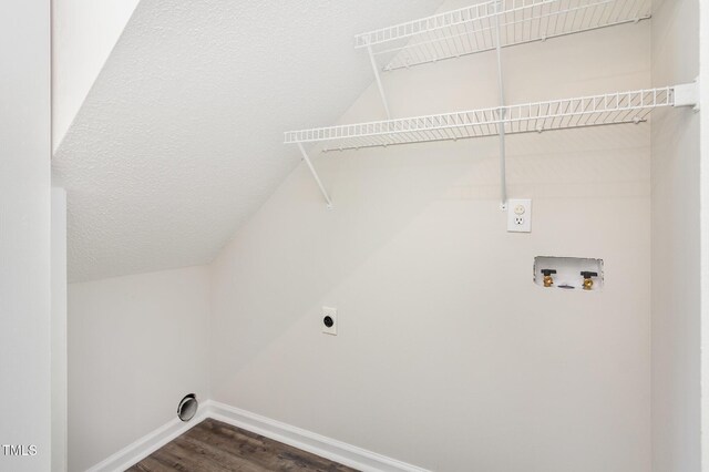 105 Hiddenwood Ct, Garner, NC 27529 - laundry area featuring hookup for an electric dryer, baseboards, dark wood-type flooring, and washer hookup