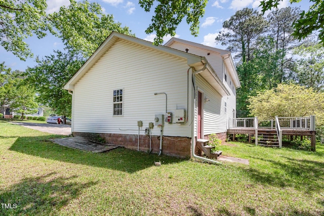 105 Hiddenwood Ct, Garner, NC 27529 - view of side of property with a yard and a deck