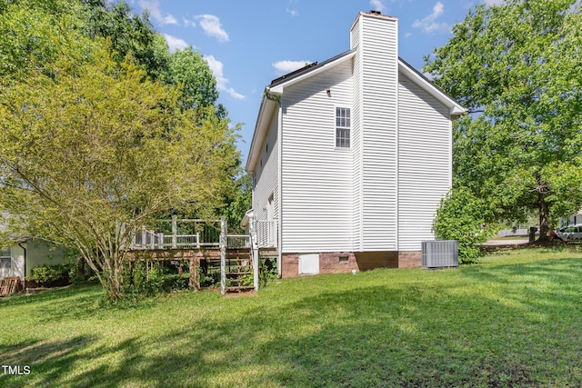 105 Hiddenwood Ct, Garner, NC 27529 - view of property exterior featuring crawl space, a chimney, central air condition unit, and a yard