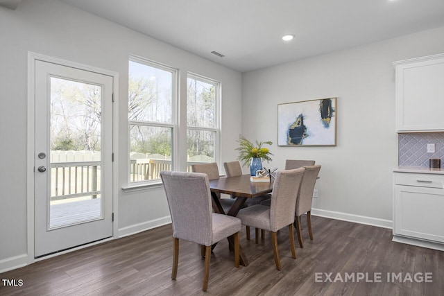 1412 Main St, Lillington, NC 27546 - dining area featuring dark wood-style flooring, baseboards, and recessed lighting