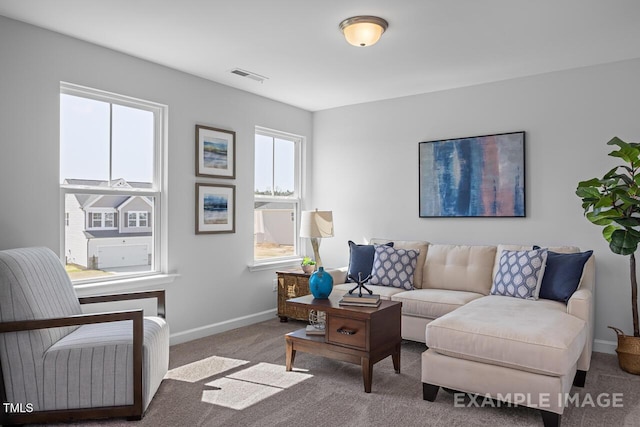 1412 Main St, Lillington, NC 27546 - living room featuring plenty of natural light, baseboards, and carpet flooring