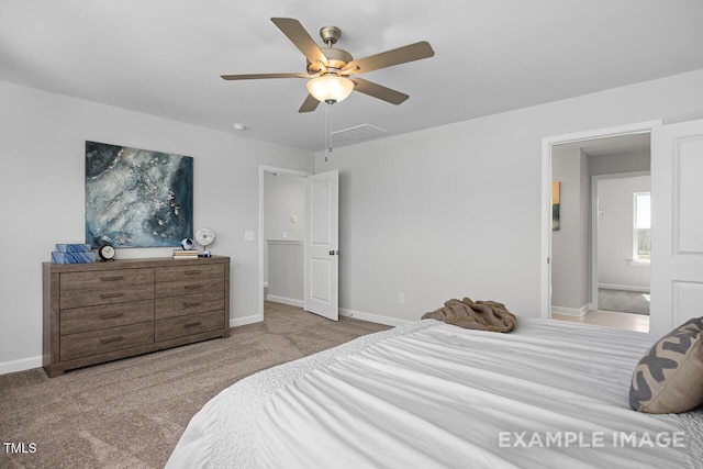 1412 Main St, Lillington, NC 27546 - carpeted bedroom featuring baseboards and a ceiling fan