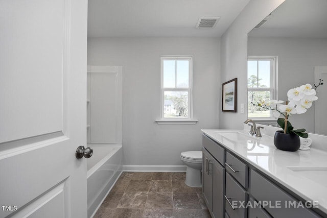 1412 Main St, Lillington, NC 27546 - full bath with baseboards, toilet, and double vanity