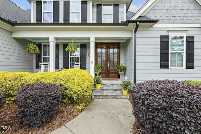entrance to property featuring a porch