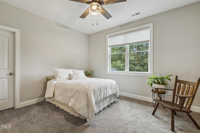 carpeted bedroom with baseboards