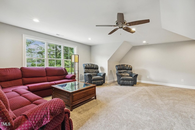 carpeted living area featuring a ceiling fan, recessed lighting, and baseboards