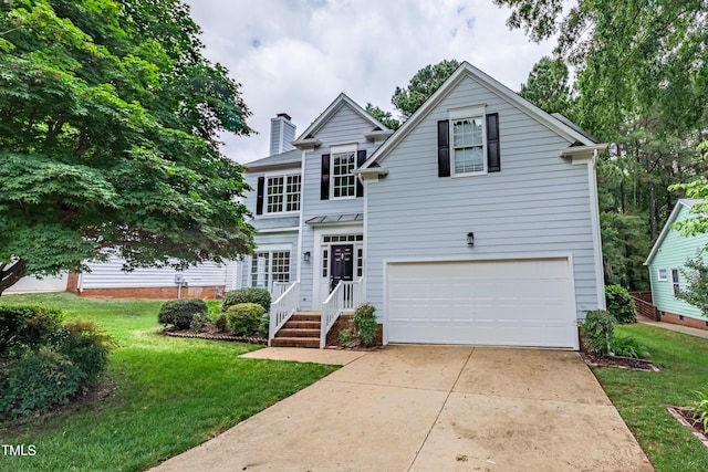 traditional-style house with an attached garage, a front yard, a chimney, concrete driveway, and a standing seam roof