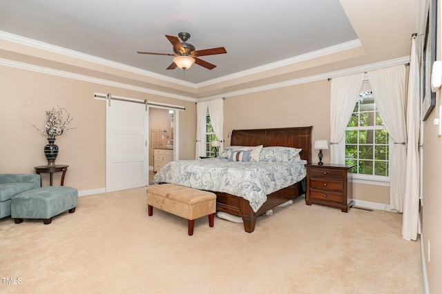bedroom featuring a barn door, light carpet, crown molding, baseboards, and ceiling fan