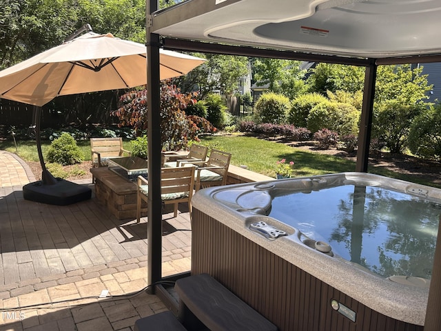 view of patio / terrace featuring a hot tub