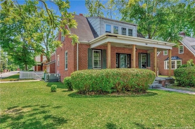 201 W 16th St, Lumberton, NC 28358 - bungalow-style home with brick siding, a porch, and cooling unit