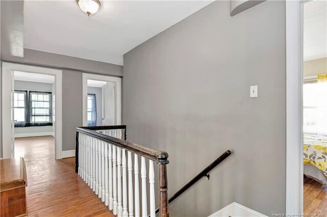 201 W 16th St, Lumberton, NC 28358 - stairway with wood finished floors and baseboards