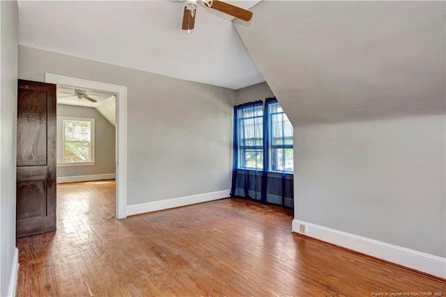 201 W 16th St, Lumberton, NC 28358 - bonus room featuring vaulted ceiling, ceiling fan, baseboards, and wood finished floors